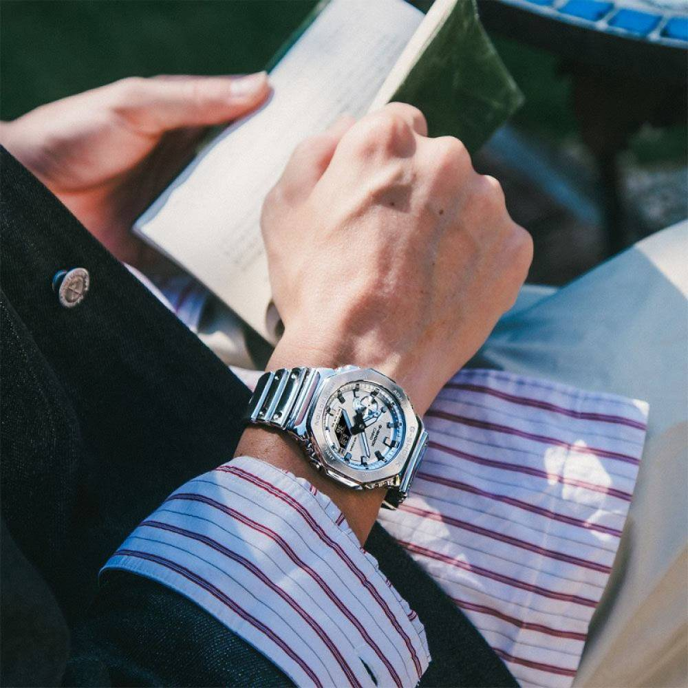 Casio GM-2100YM-8AER G-Shock - Унисекс ръчен часовник с кварцов механизъм - корпус от Стомана - Полимер - цвят Сребрист